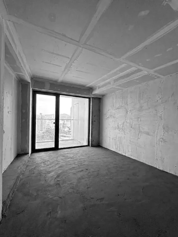 Studio apartment in Marriott residence in Batumi during renovation, plastered walls and boarded ceiling ready for finishing