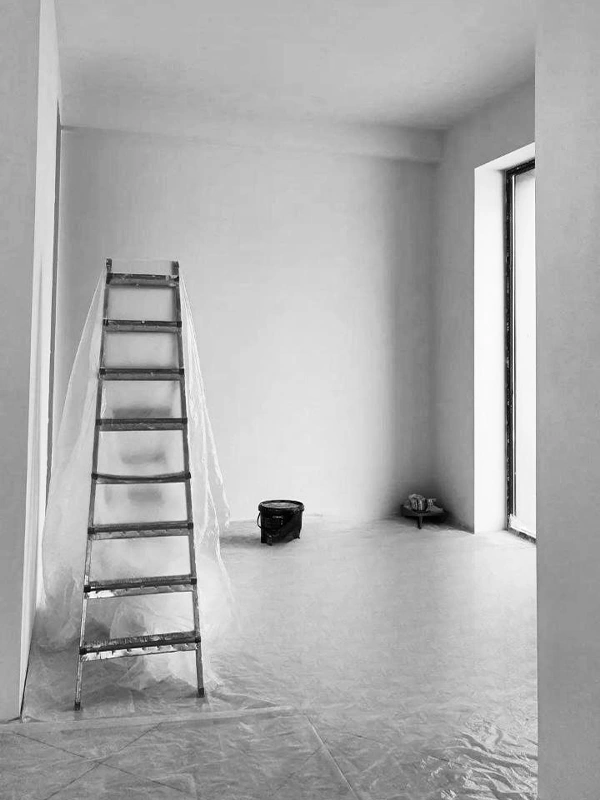 Arcus renovation in progress at Wabi-Sabi, with clean walls, flooring installed, and tools prepared