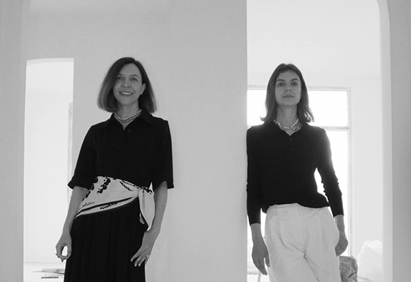 Natallia Klimovich and Daria Ipatieva, founders of Arcus, standing inside a renovation project apartment